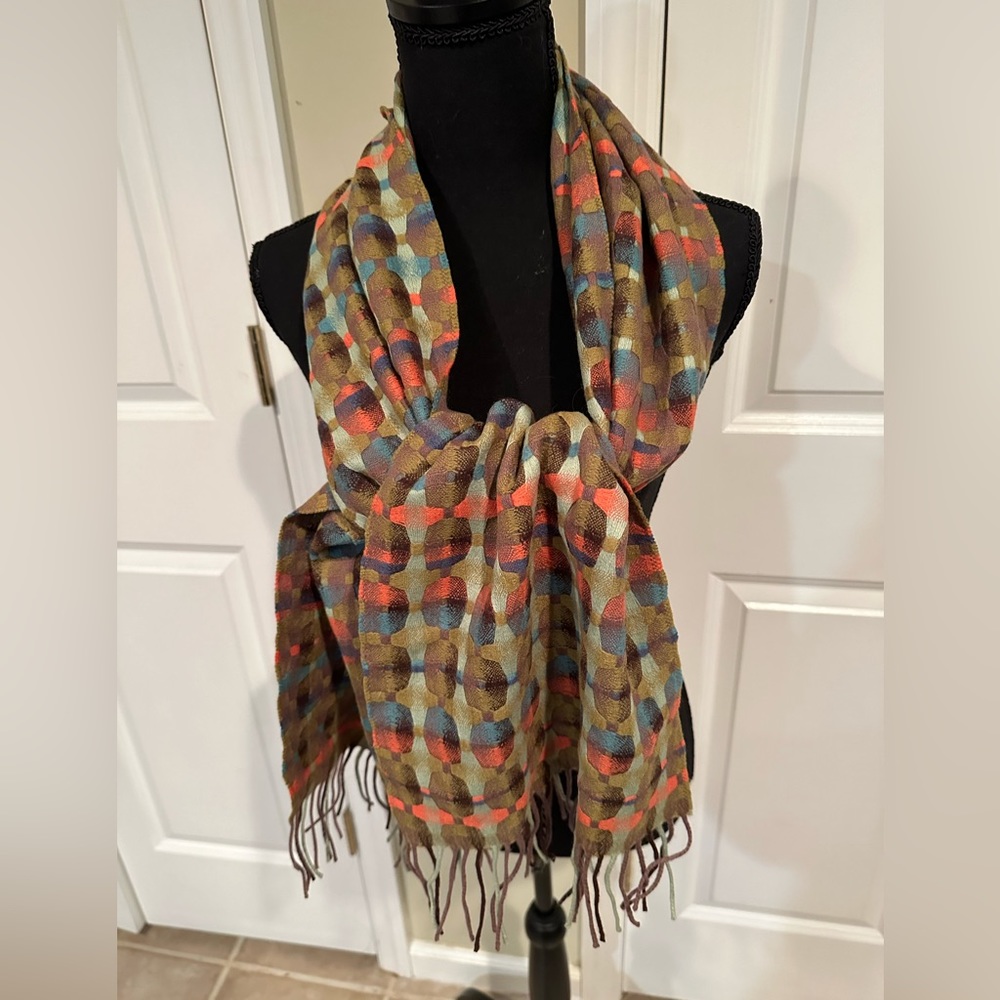 Scarf with multi colors , orange, lime green, brown and tan. 100% wool